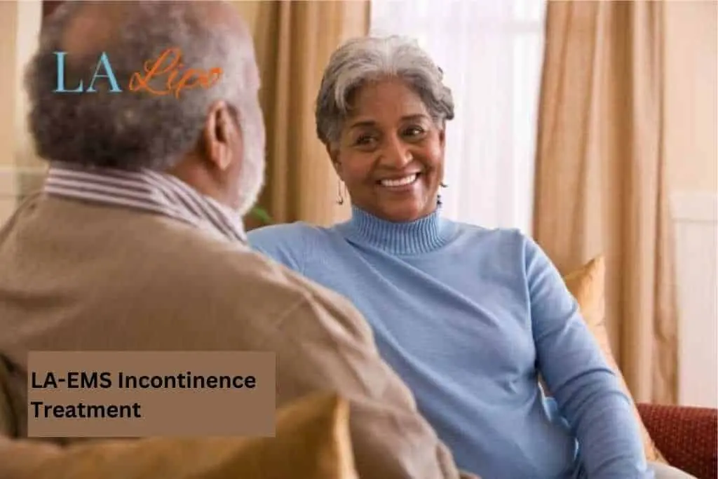 Couple sat smiling at each other - LA-EMS treatment Spalding