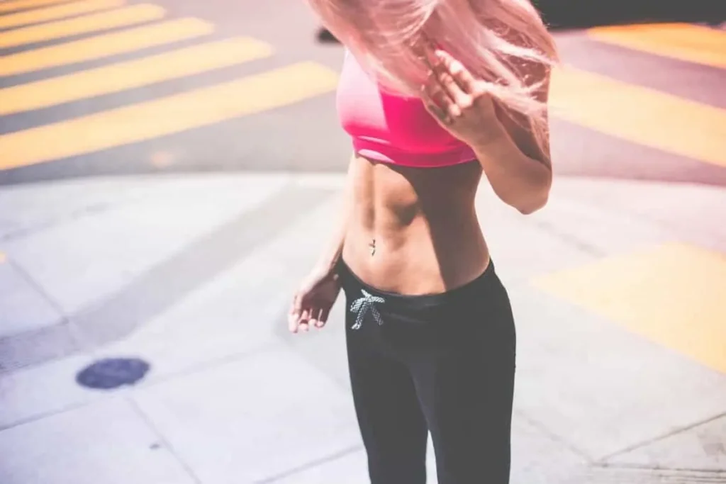 Woman with toned stomach after LA-EMS Body Sculpting Treatment Spalding